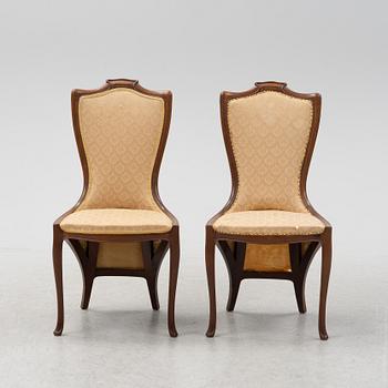 A pair of mahogany art nouveau chairs by Edward Colonna for Samuel Bing, Paris, early 20th Century.