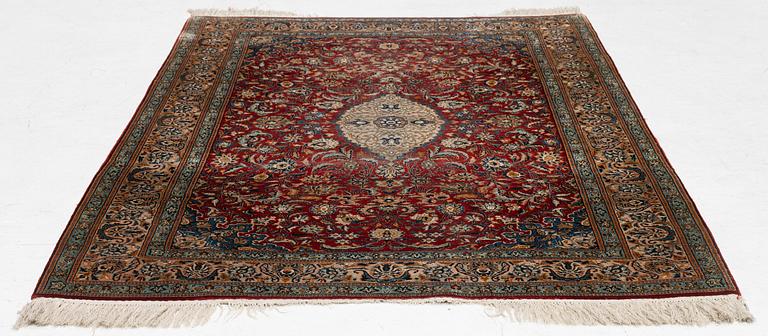 A silk Kashmir rug, c. 176 x 121 cm.