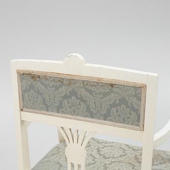A pair of Empire style armchairs, 20th century.