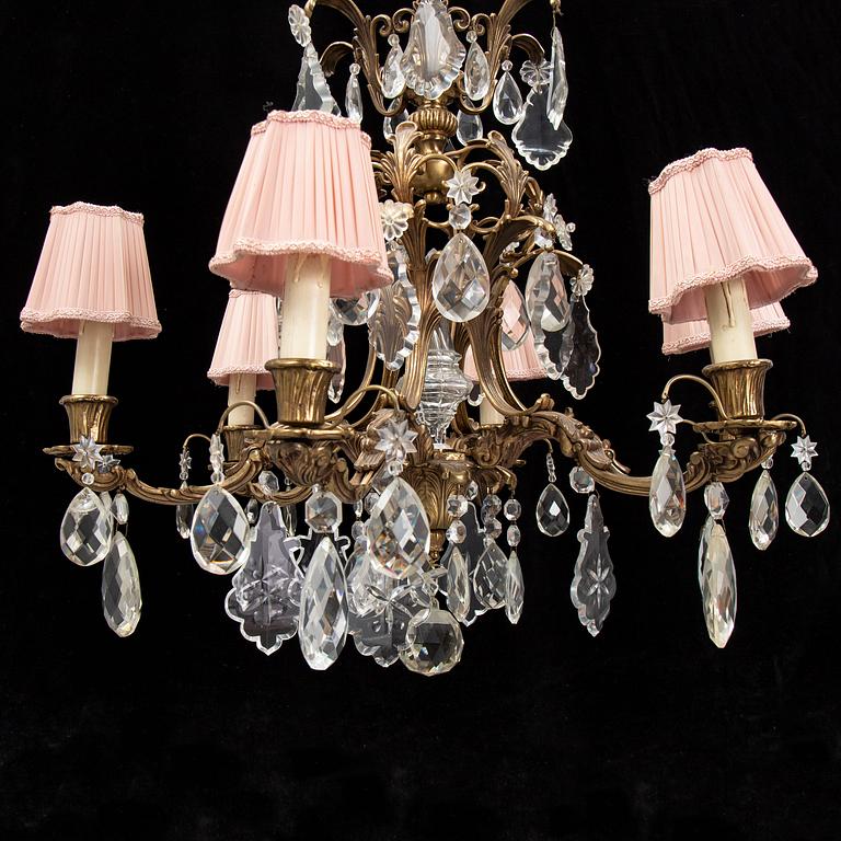 A brass and glass chandelier.