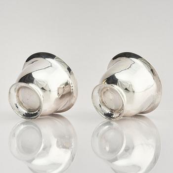 A pair of Swedish parcel-gilt silver dessert bowls with stand, mark of Gustaf Möllenborg, Stockholm 1830.