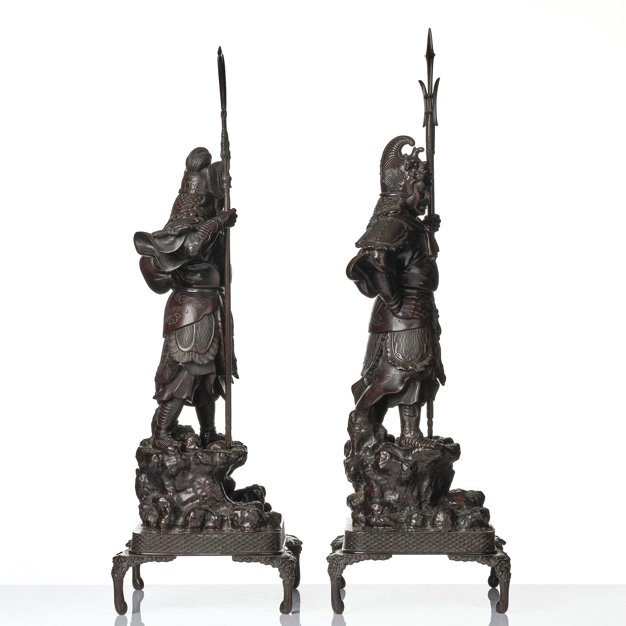 A pair of Japanese bronze guardians, Meiji period (1868-1912).