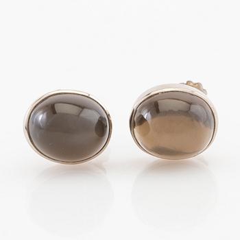 Earrings, a pair of 18K white gold with cabochon-cut grey moonstones, Gunnar Fahlström, Stockholm 1955.
