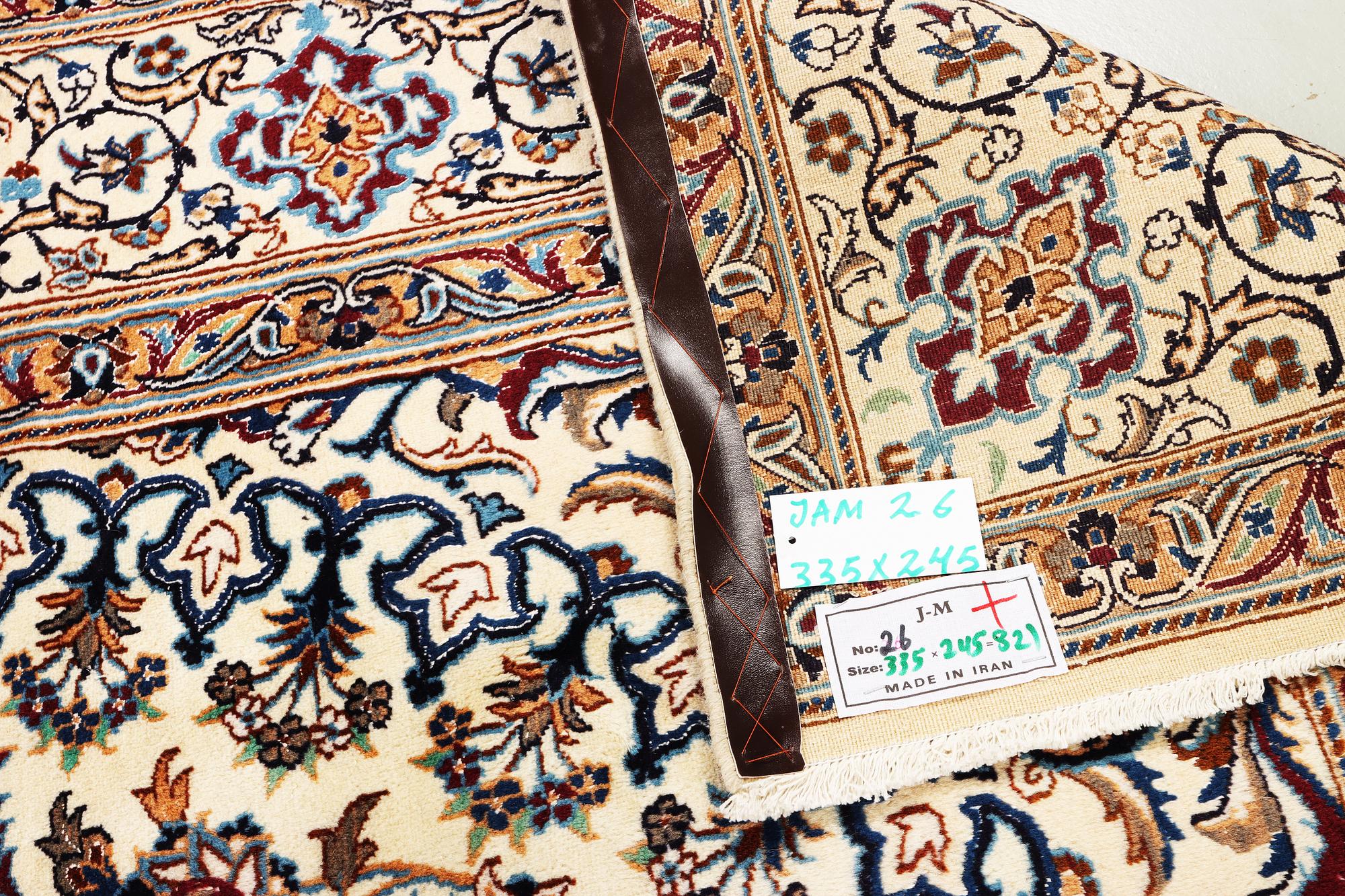 A part silk Nain carpet, a. 335 x 245 cm.