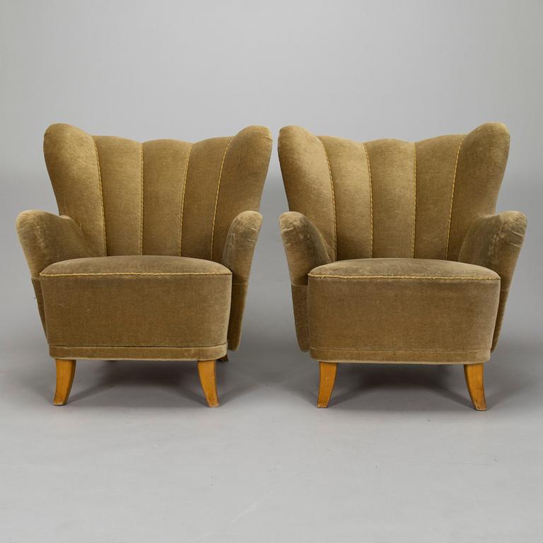 A pair, ofmid-20th century armchairs.