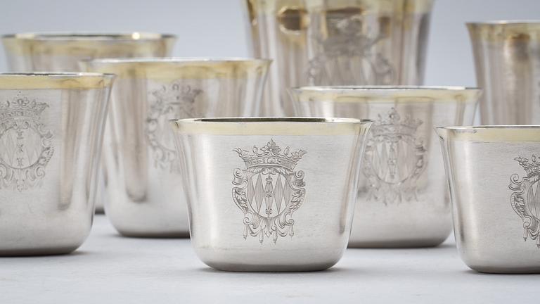 A set of 12 Swedish early 18th century parcel-gilt hunting-beakers and cover, marks of Petter Henning, Stockholm 1707.