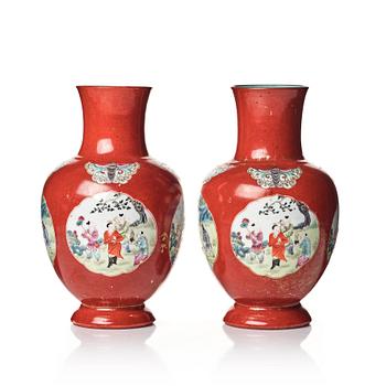 822. A pair of coral red and famille rose vases, late Qing dynasty.