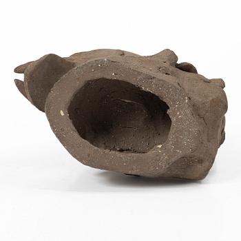 Tyra Lundgren, a stoneware sculpture of a woodpecker, executed in her own studio.