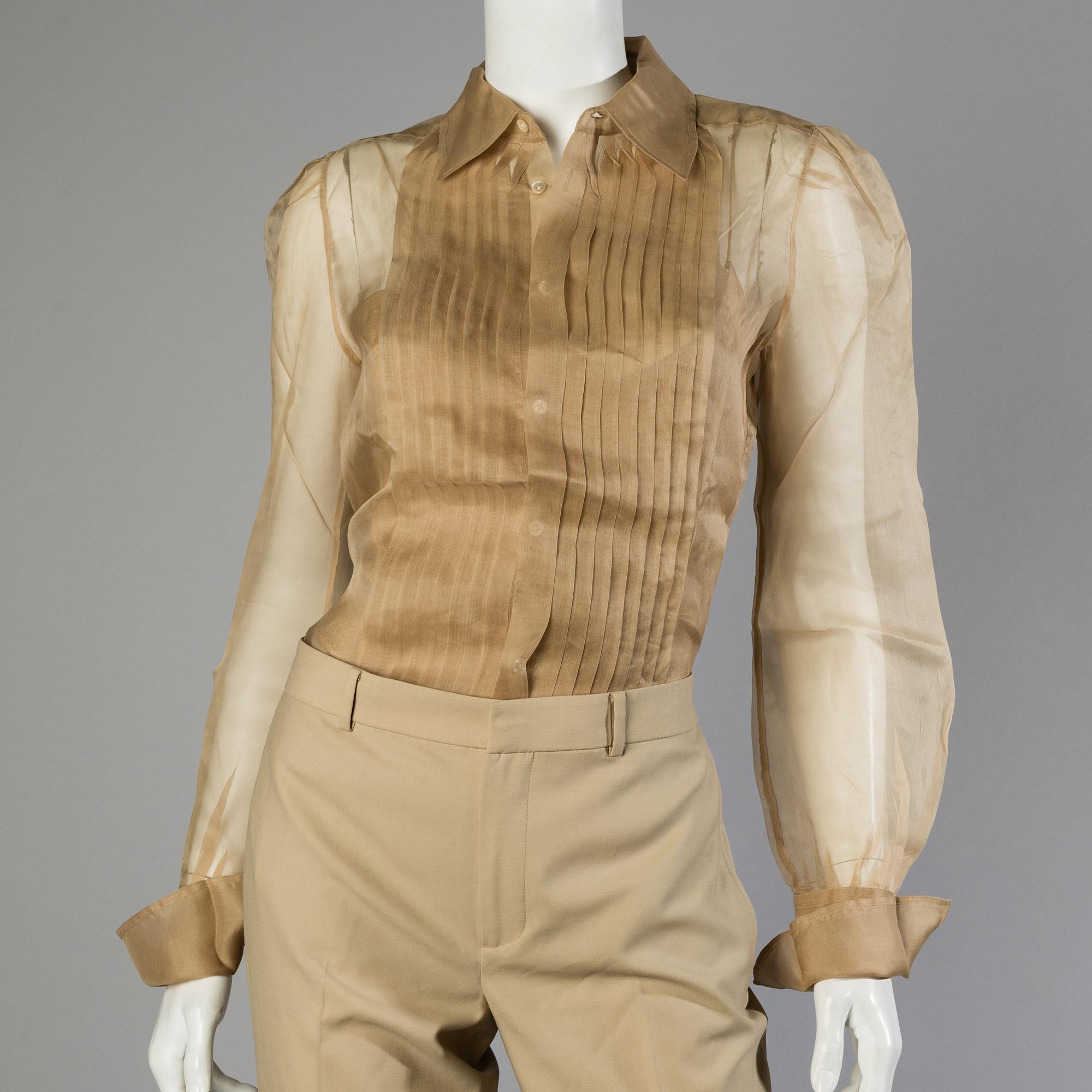 Trousers, shirt and west by Ralph Lauren.