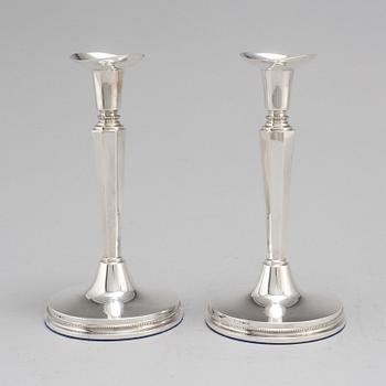 A pair of silver candle sticks by Eric Löfman, Uppsala 1961.