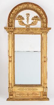 An Swedish Empire mirror, first half of the 19th century, attributed to Petter Gustaf Bylander, (Gothenburg 1802-59).