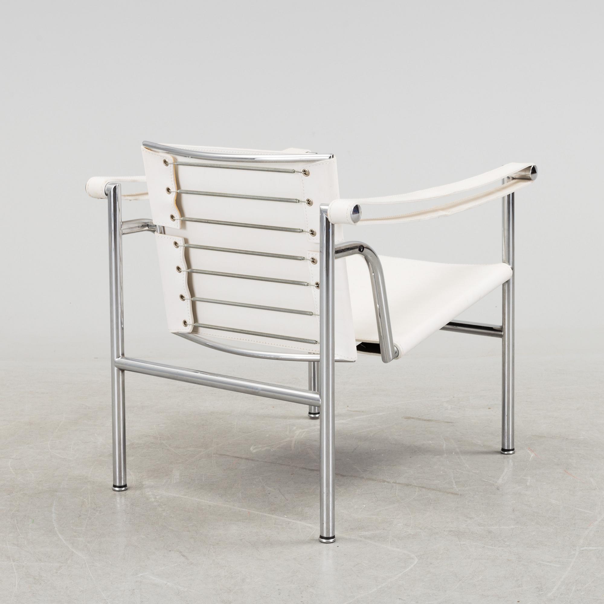 A "LC-1" ARMCHAIR DESIGNED BY LE CORBUSIER FOR CASSINA.