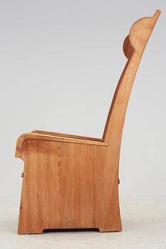 A stained pine armchair attributed to either Axel Einar Hjorth or David Rosén, Nordiska Kompaniet, ca 1932.