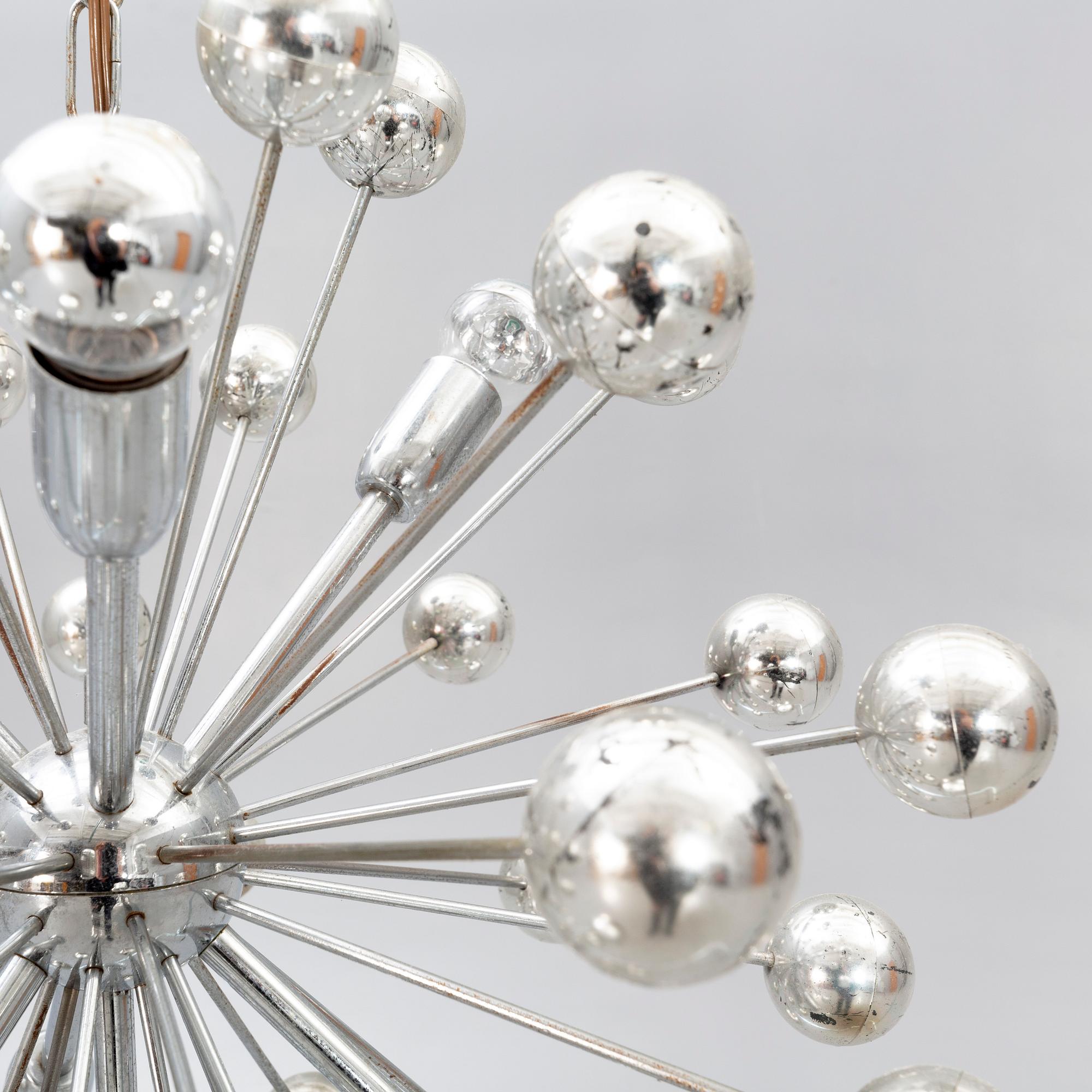 A Paul de Haan ceiling pendant alter part of the 20th century.