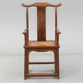 A Chinese wooden armchair, 20th century.