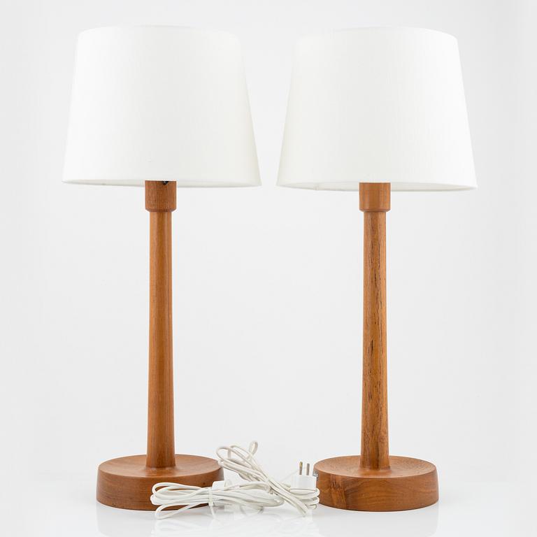 Uno & Östen Kristiansson, a pair of teak table lights, Luxus, Vittsjö, 1950s/60s.