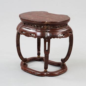 A red and gold lacquer stool, Qing dynasty presumably 18th century.