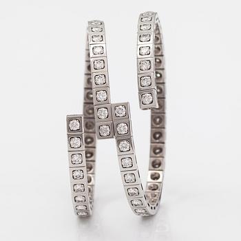 Cartier, Rannekoru "Tectonique", 18K valkokultaa, briljanttihiottuja timantteja n. 11.90 ct yht. Merkitty CT6808, JC.