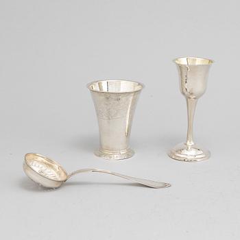 A Swedish 18th / 19th century silver beaker, cup and caster-spoon.