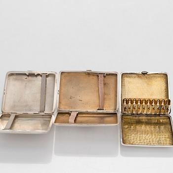 Three silver cigarette cases, incl. Nussbaum & Hunold and EL Weimann.