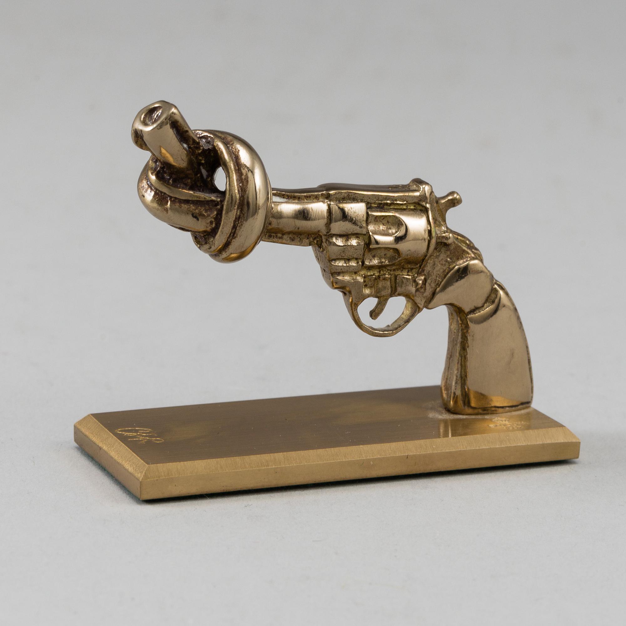 CARL FREDRIK REUTERSWÄRD, a brass 'Non Violence' sculpture from Skultuna.