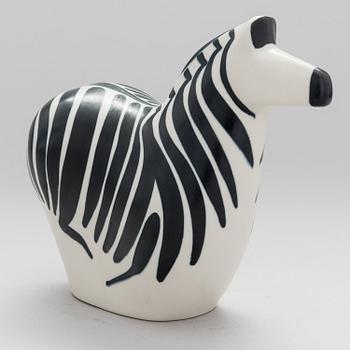 A STONEWARE FIGURINE by LILLEMOR MANNERHEIM, signed Lillemor Arabia -85.