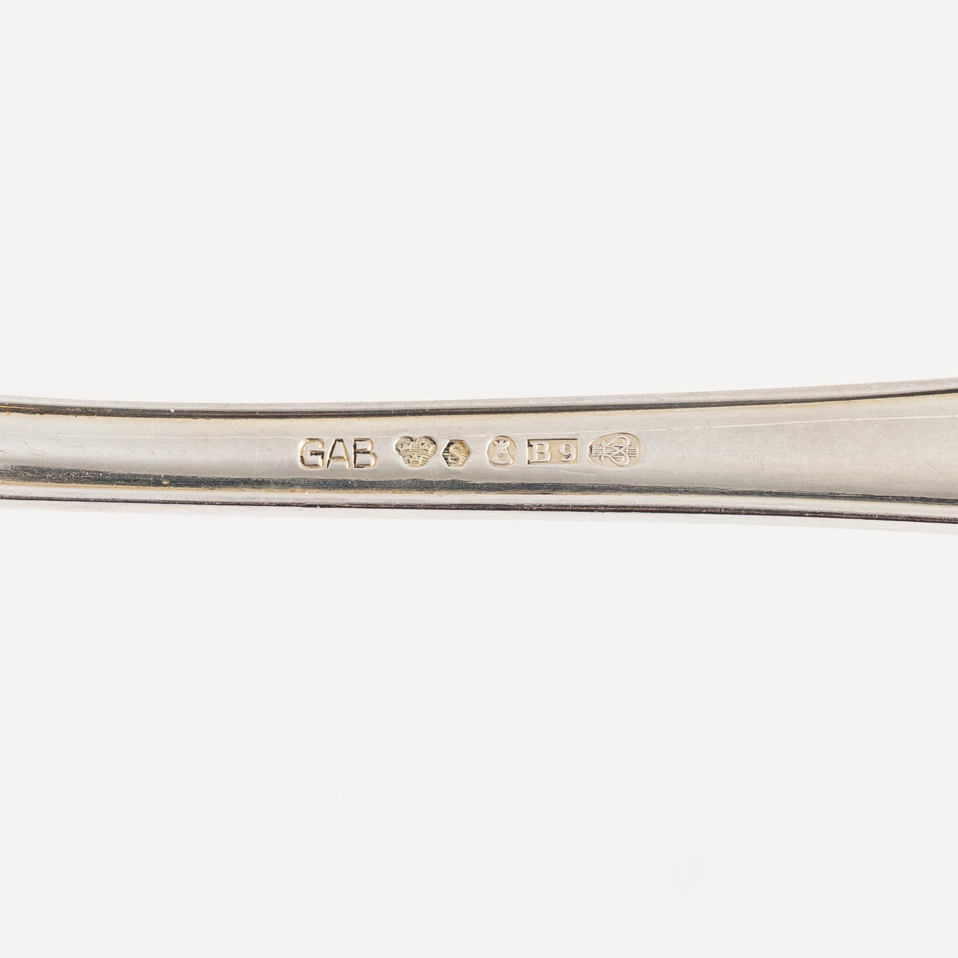 An 107-piece Swedish silver cutlery, model 'Svensk rund', mark of GAB, Stockholm, including 1950.