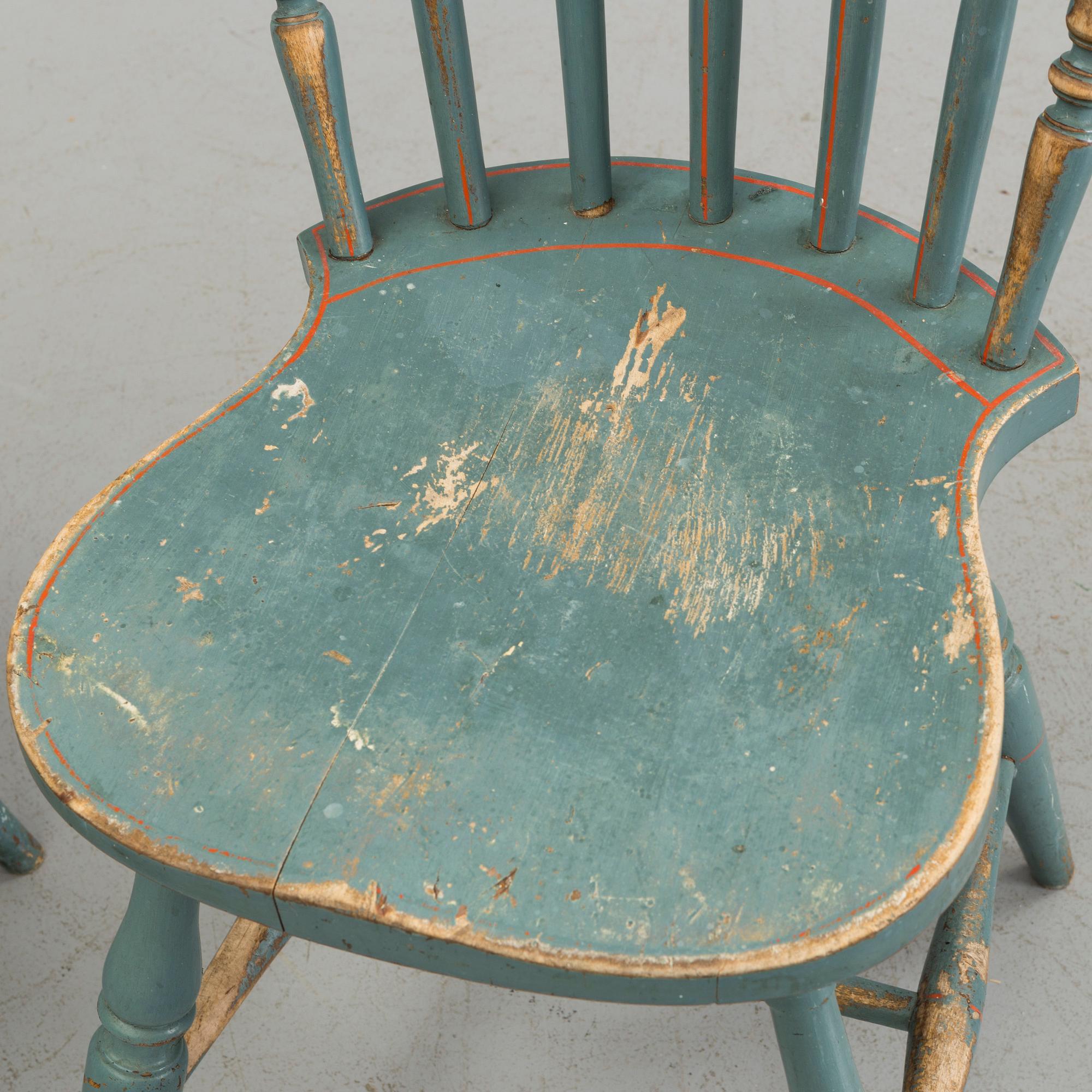 A pair of late 19th century painted chairs.
