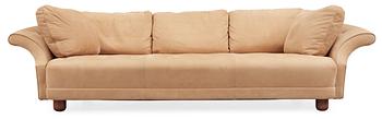 A Josef Frank 'Liljevalchs' sofa, Svenskt Tenn, reupholstered in light brown suede.