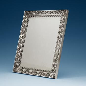 926. A Swedish 19th century silver table-mirror, makers mark of Adolf Zethelius, Stockholm 1831.