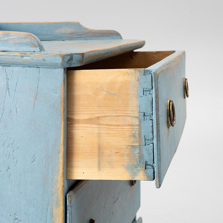 A 19th century chest of drawers.