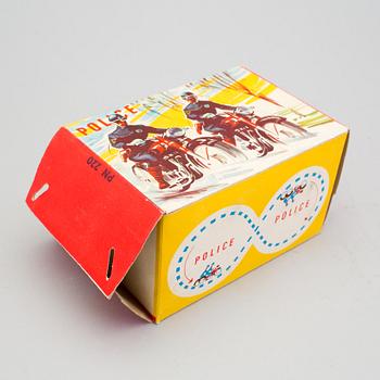 A tinplate synchronous motorcycle by Philipp Niedermeier, Germany, 1950s.
