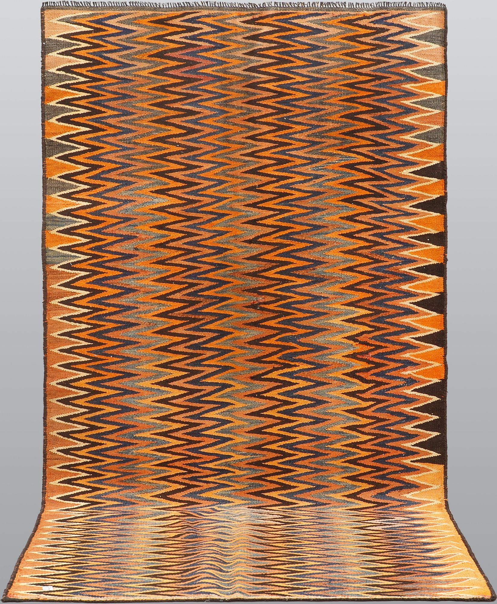 A carpet, Persian Nomad Kilim, ca 267 x 145 cm.