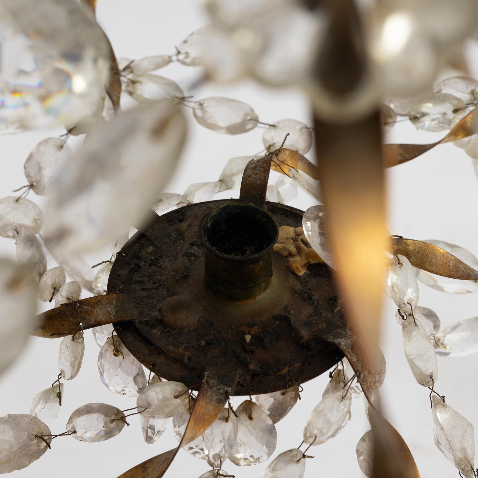 A late Gustavian gilt brass and cut glass seven-light chandelier, Stockholm, late 18th century.