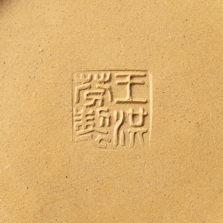 A set of a yellow yixing 'gongfu' teapot and four cups, China, 1980s.