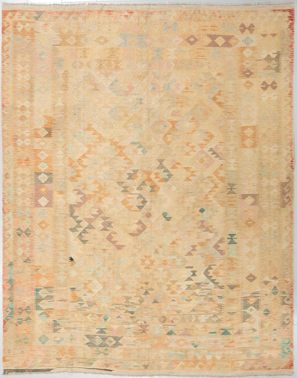 A kelim rug, 305 x 260 cm.