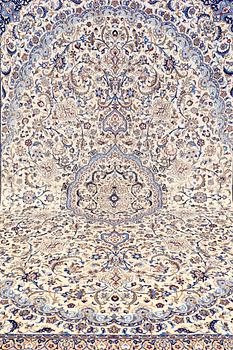 A CARPET, Nain part silk, s.k 9 LAA, 588 x 393 cm.