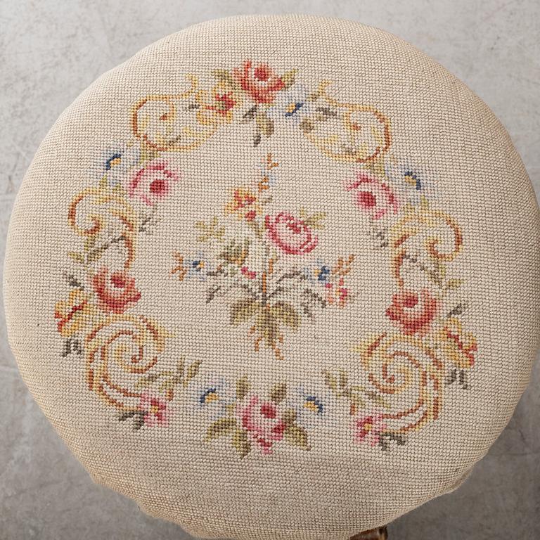 A second half of the 19th century table with mirror and a stool.