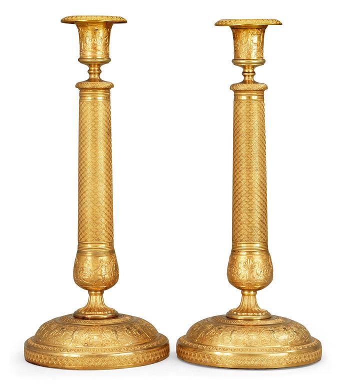 A pair of Russian Empire gilt bronze candlesticks, Moscow ca 1830.