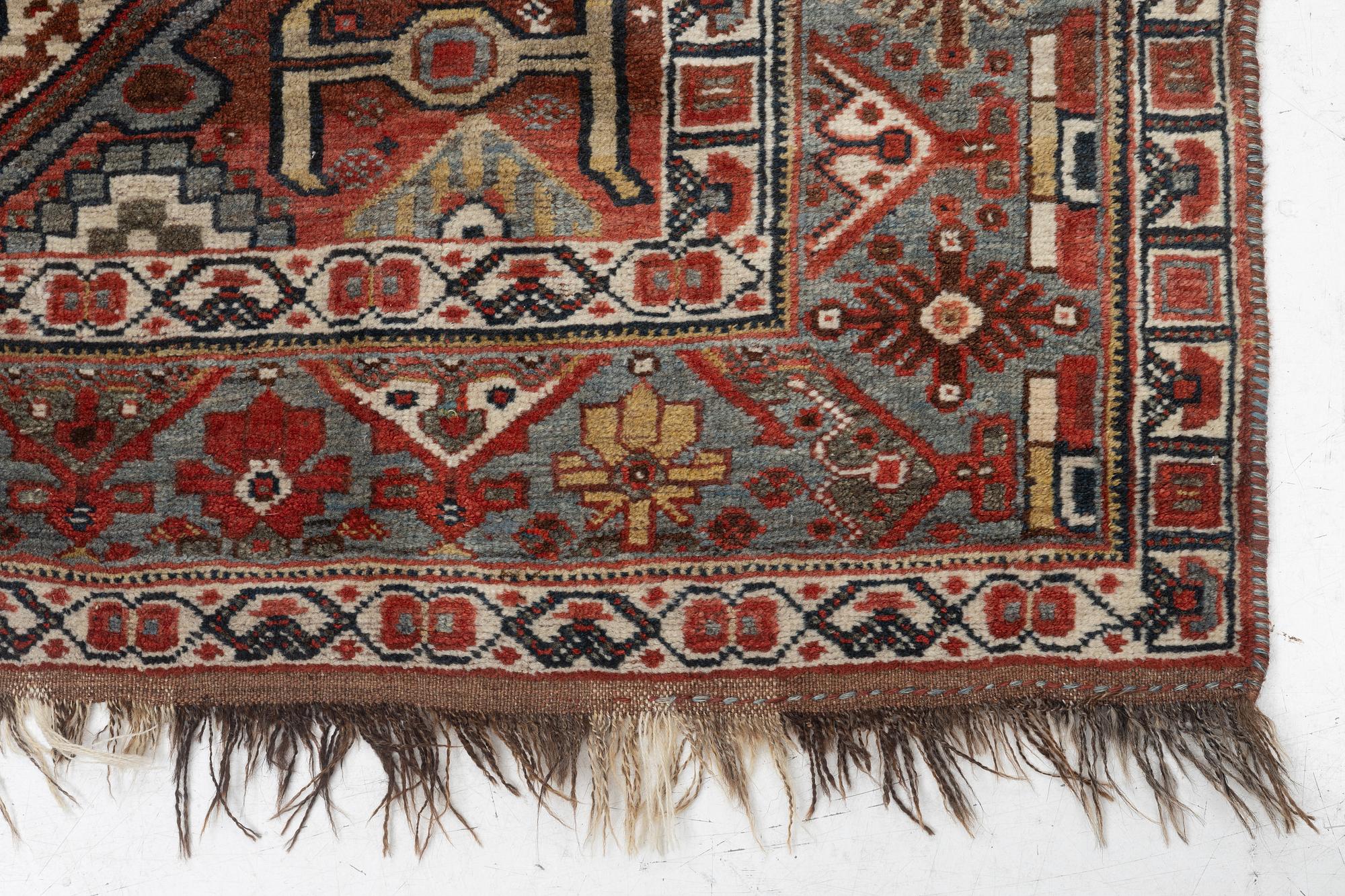 An antique Qashqai rug, southeastern Iran, c. 242 x 170 cm.