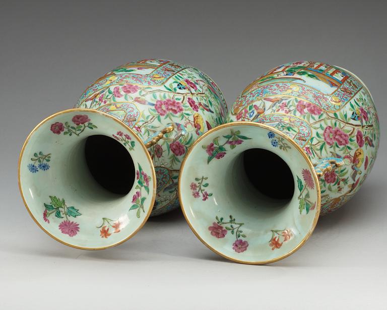 A pair of famille rose Canton vases, Qing dynasty, 19th Century.