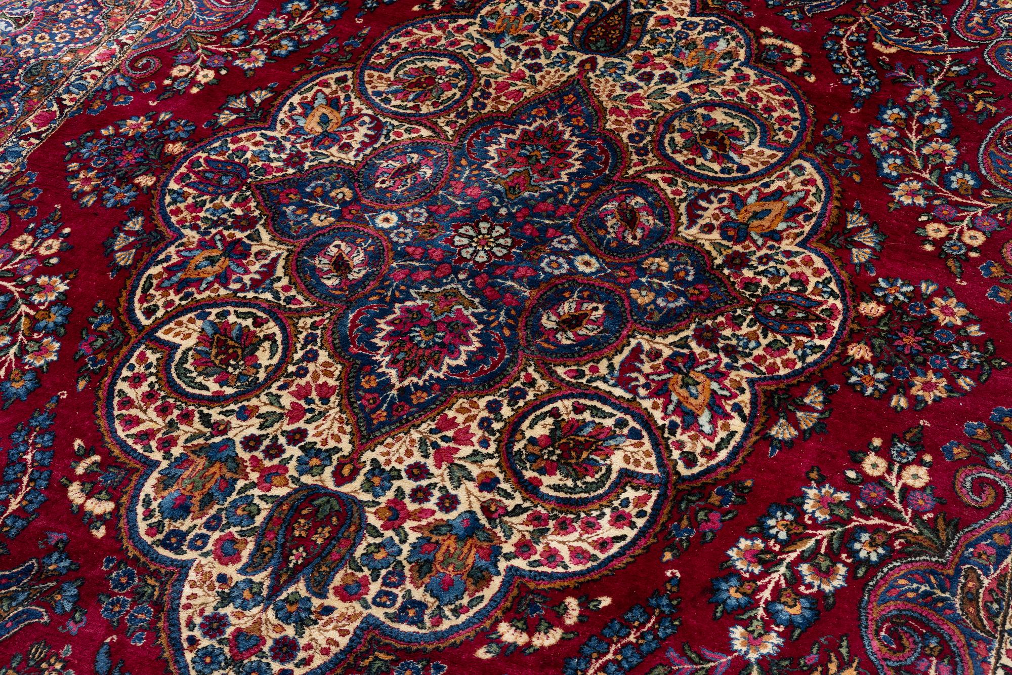 A Kerman carpet, c. 365 x 265 cm.