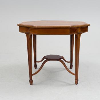 A 1920/30s Swedish Grace sofa, a pair of chairs, a pair of armchairs and a table veneered with mahogany.