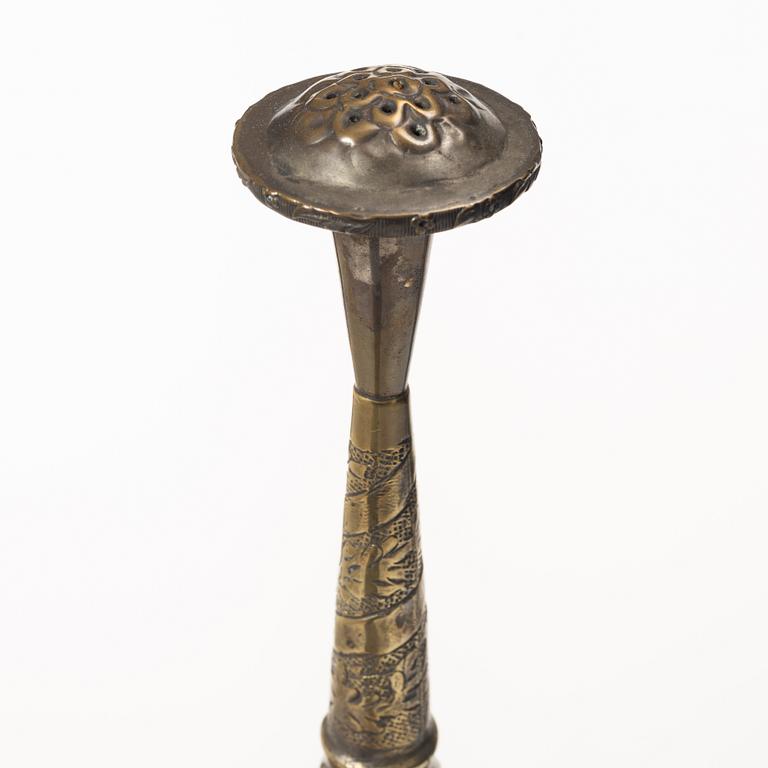 An 20th century british Raj repoussé metal rosewater sprinkler.