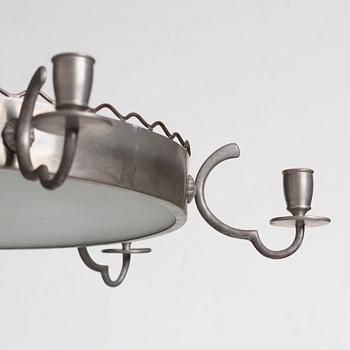 Firma Svenskt Tenn, a pewter and brass chandelier, Stockholm 1926.
