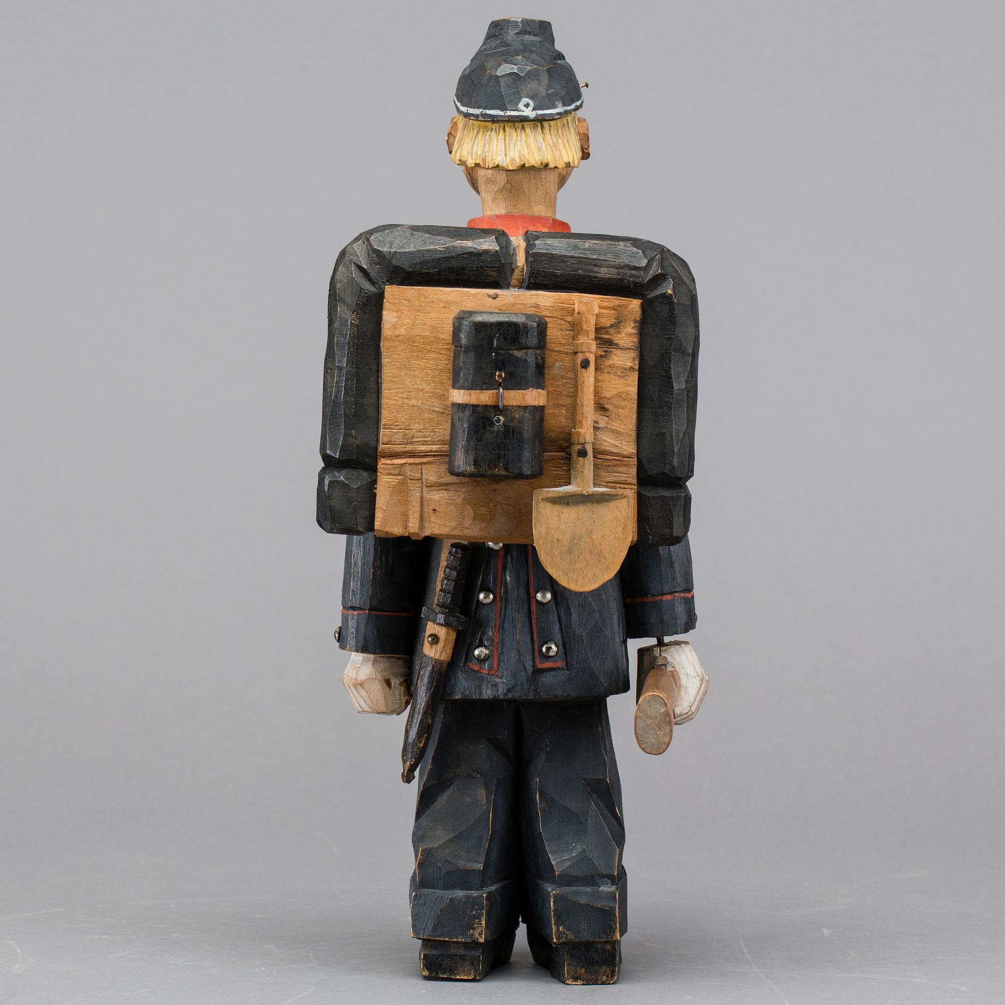 TWO WOOD SCULPTURES, one signed Axel Ericsson.