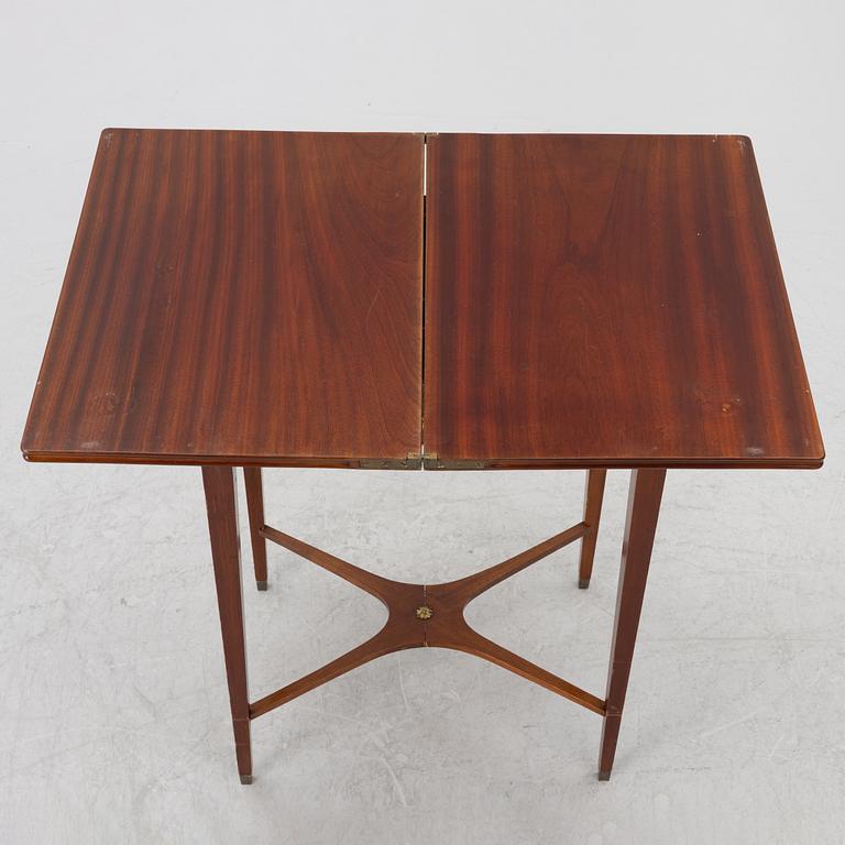 A late Gustavian style games table/sewing table, early 20th century.