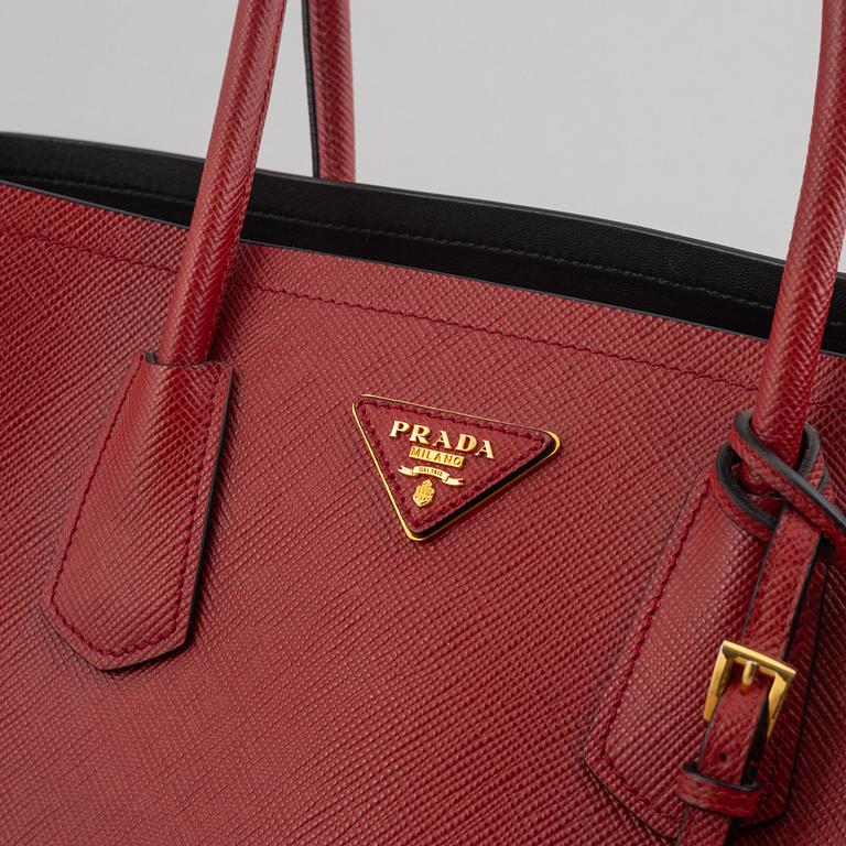 Prada, A red Saffiano Tote Bag.