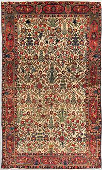 A CARPET, semi-antique West Persian, around 358 x 204 cm.