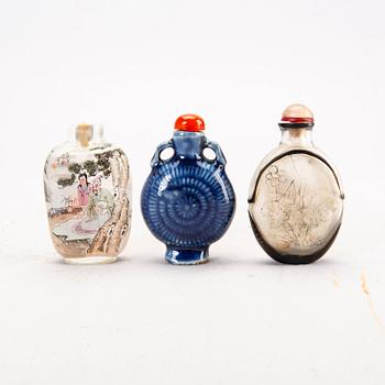 A set of three Chinese glass and porcelain snuff bottles 20th century.